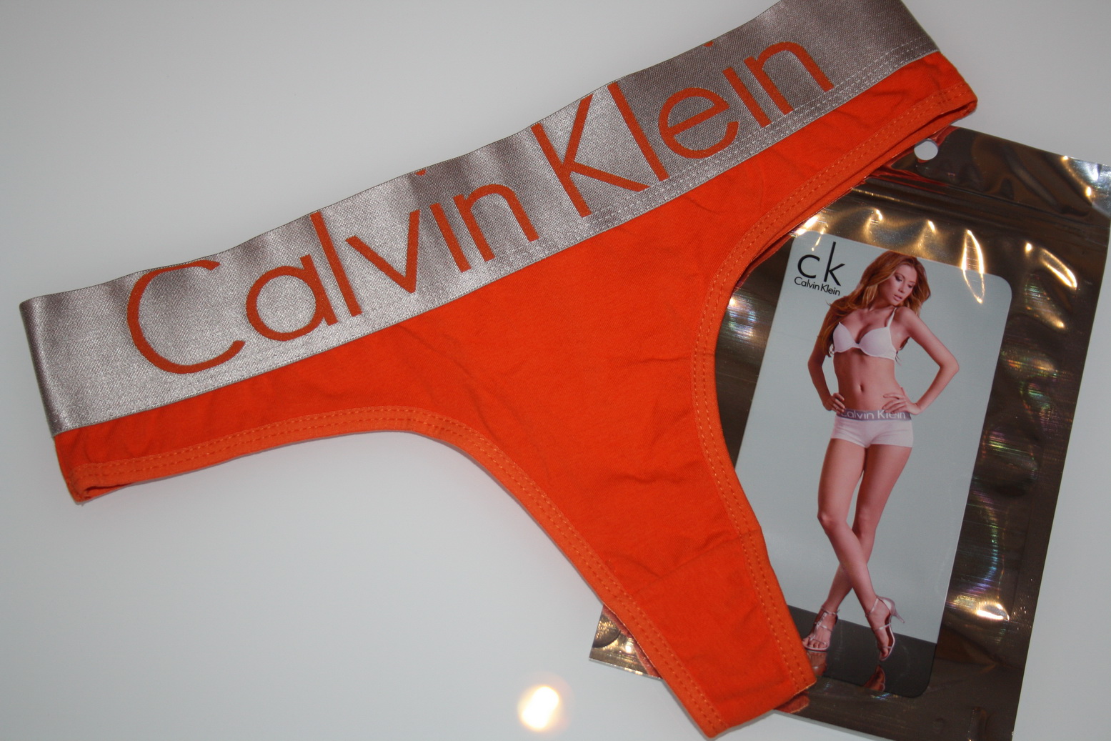 Жіночі стрінги оранжеві Calvin Klein Steel Orange фото 1